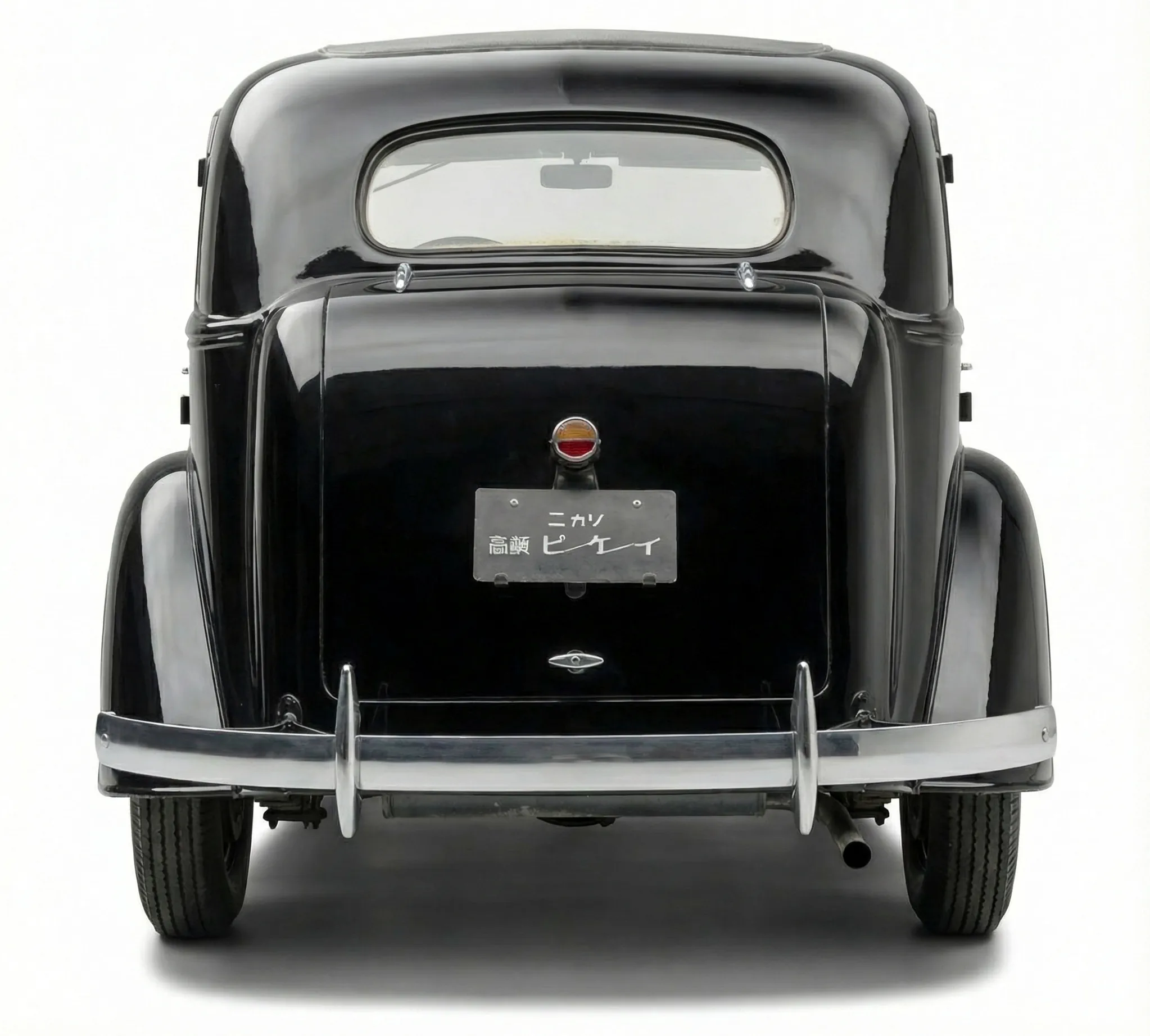 Японский автомобиль Nissan 70 Sedan '1937–39, вид сзади