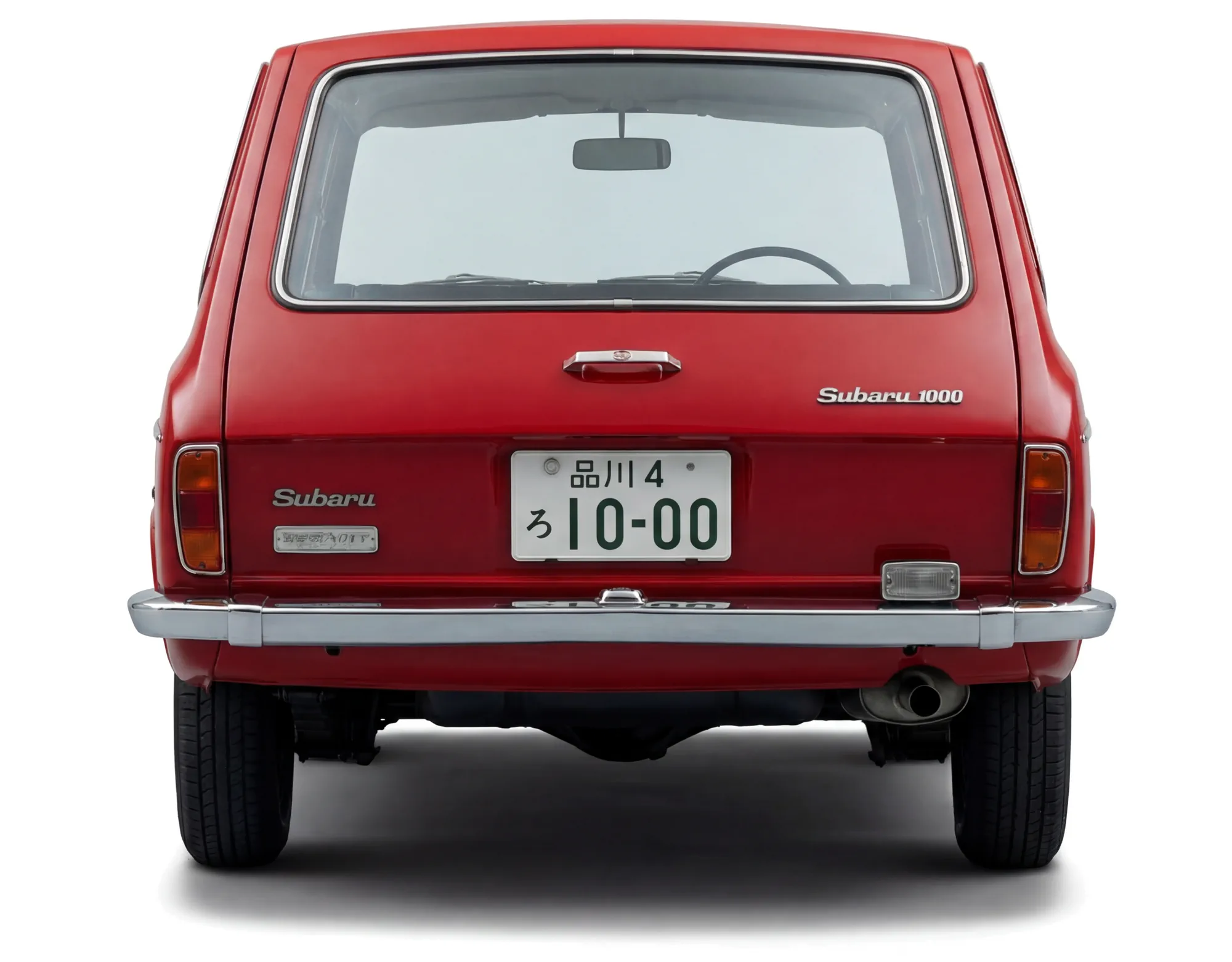 Subaru 1000 Van универсал 1967 — красный — белый фон — вид схади